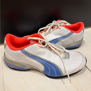 Puma Super Elevate women's running shoes in a white, blue, bright orange 7.5